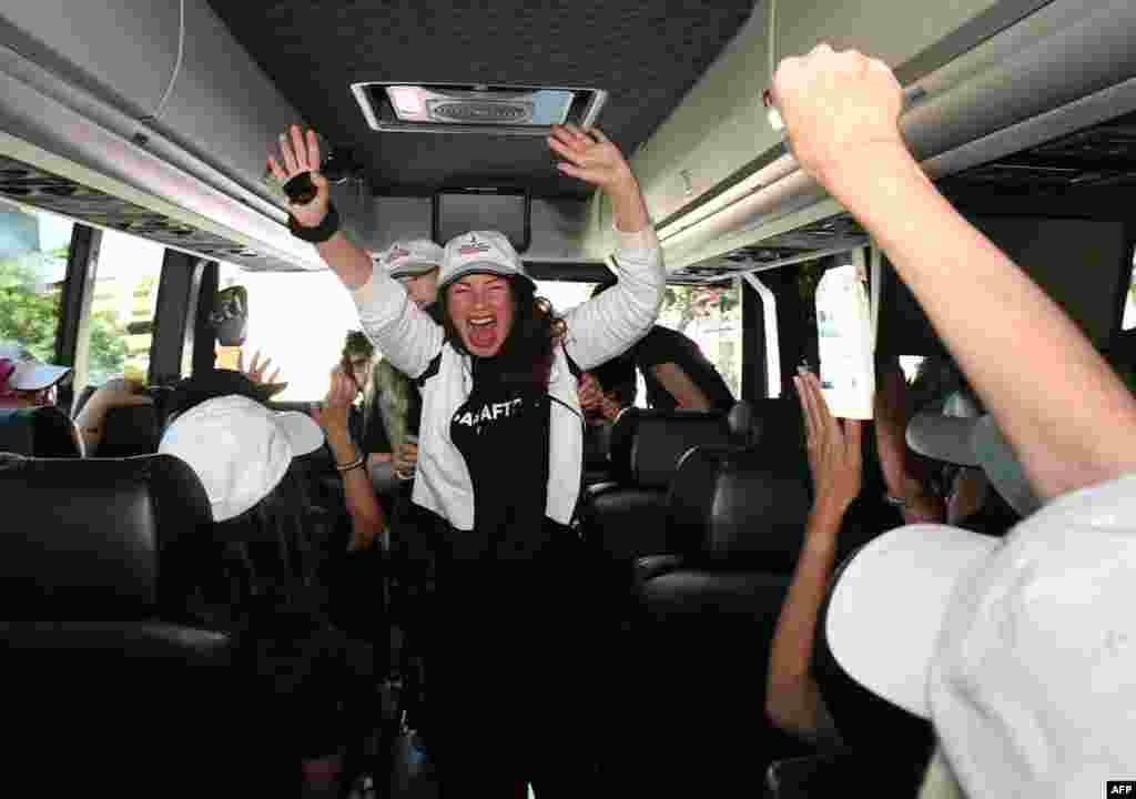 SAG-AFTRA President Fran Drescher, center, boards a bus with guild members traveling to picket lines in Los Angeles, California. Tens of thousands of Hollywood actors went on strike, effectively bringing the giant movie and television business to a halt as they joined writers in the first industry-wide walkout in 63 years. 
