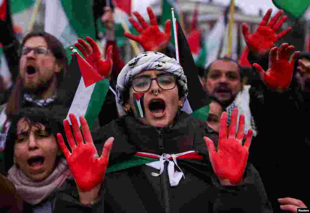 Pro-Palestinian protesters gather near the International Court of Justice (ICJ), on the day judges hear a request for emergency measures by South Africa to order Israel to stop its military actions in Gaza, in The Hague, Netherlands.