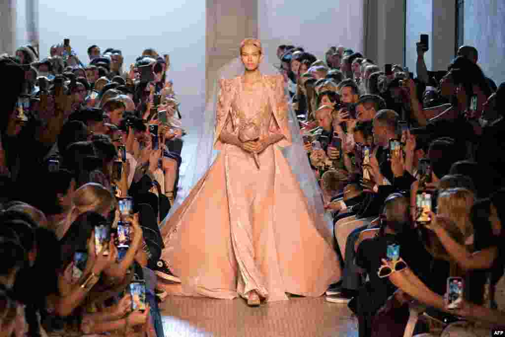 A model presents a creation by Elie Saab during the Women's Haute-Couture Fall/Winter 2023/2024 Fashion Week in Paris.