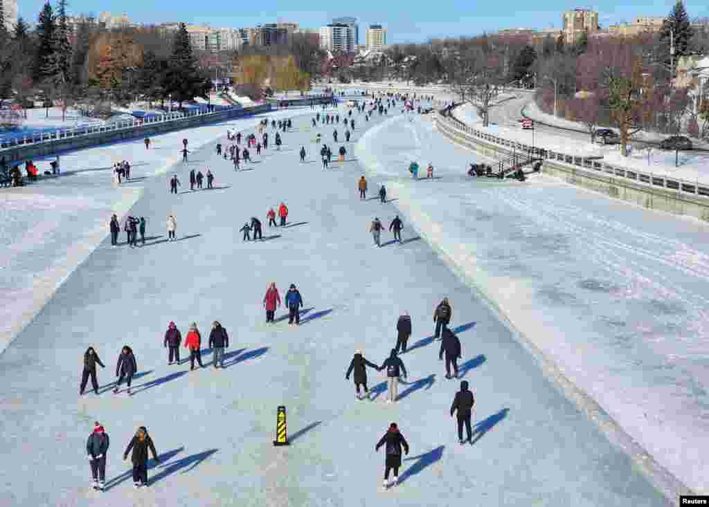 The frozen 7.8-km (4.9-mile) Rideau Canal Skateway, the world's largest natural ice skating rink, re-opens for the first time in two years, in Ottawa, Ontario, Canada, Jan. 21, 2024.