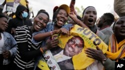 Supporters of Deputy President and presidential candidate William Ruto celebrate his victory over opposition leader Raila Odinga in Eldoret, Kenya, Aug. 15, 2022.