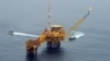 FILE - An aerial view of Total oil platform at Amenem, 35 kilometers away from Port Harcourt in the Niger Delta, Apr. 14, 2009.