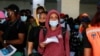 Nigerian students, who studied in Ukraine, arrive at Nnamdi Azikiwe International Airport after fleeing Russia's invasion of the country, in Abuja, Nigeria, March 4, 2022. Nigeria says that 80 of its students remain trapped in the southern city of Kherson.