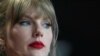No habrá cargos contra el padre de Taylor Swift por incidente con paparazzo en Australia