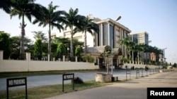 FILE - People are seen outside of the Federal High Court in Abuja, Nigeria, Dec. 2, 2021.
