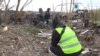 La police scientifique ukrainienne collecte des preuves des crimes de guerre 