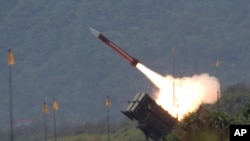 FILE - A U.S.-made Patriot missile is launched during exercises west of Taipei, Taiwan, July 20, 2006. Differences are emerging between Congress and the White House concerning a proposed missile defense policy.