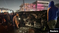 Ostaci vozila nakon napada dronom (Foto: REUTERS/Ahmed Saad)