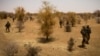 FILE - A photo taken on April 10, 2013 shows French soldiers taking part, 105 kms north of the northeastern Malian city of Gao, in an operation to find Islamist fighters. 