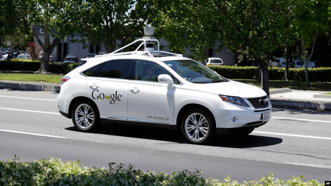 FILE - A Google self-driving car goes on a test drive near the Computer History Museum in Mountain View, Calif, May 14, 2014.