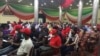 Attendees listen to health authorities at an Abuja summit to create awareness about tuberculosis in Nigeria, during the World Tuberculosis Day celebration, March 24, 2022. (Timothy Obiezu/VOA)