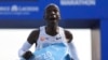 FILE - Kenya's Eliud Kipchoge crosses the line to win the Berlin Marathon in Berlin, Germany, Sept. 25, 2022.