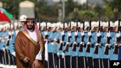 Saudi Crown Prince Mohammed bin Salman, with Turkish President Recep Tayyip Erdogan (not pictured), reviews a military honor guard during a welcome ceremony, in Ankara, Turkey, June 22, 2022.