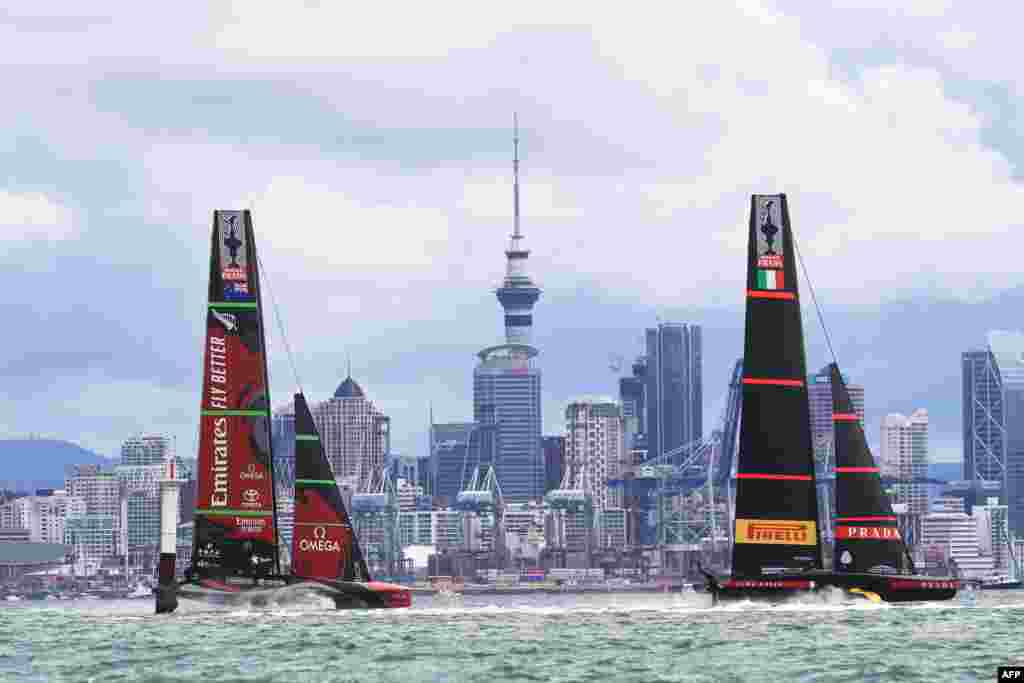 Italy's Luna Rossa (R) competes against Team New Zealand during day six of the America's Cup in Auckland, New Zealand.