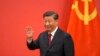 资料照：中国领导人习近平与中共党旗