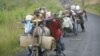 Congolese flee the eastern Congolese town of Sake , 27km west of Goma, November 23, 2012. 
