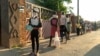 FILE - Kulabantwana abanengi abalakho ukungalobi ngemfaneli imihloliso lonyaka ngenxa yomkhuhlane weCoronavirus COVID-19.