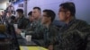 FILE - A US Army sergeant works on battle plans alongside Republic of Korea air force officers, March 10, 2015, during an exercise at South Korea's Osan Air Base. (US Air Force photo)