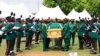 Military pallbearers carry the coffin of Nigeria's army chief, Lt. Gen. Ibrahim Attahiru, who was killed along with 10 others in plane crash on Friday, during a funeral at the military cemetery in Abuja, Nigeria, May 22, 2021.