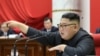 This picture taken Dec. 28-31, 2019, and released from North Korea's official Korean Central News Agency, Jan. 1, 2020, shows North Korean leader Kim Jong Un attending the 5th Plenary Meeting of the 7th Central Committee of the Workers' Party of Korea