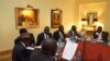 Negotiators at South Sudan peace talks in Addis Ababa review a draft cessation of hostilities agreement on Jan. 13, 2014.
