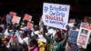 South Africans protest in solidarity against the abduction three weeks ago of hundreds of schoolgirls in Nigeria, May 8, 2014.