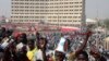 All Progressives Congress party supporters gather to welcome presidential candidate Muhammadu Buhari in Kano, January 20, 2015. As Nigeria approaches its most divisive and closely fought election since the end of military rule in 1999, its leaders are having to reassure voters that Africa's most populous nation will remain in one piece. 