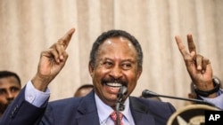 FILE - Sudan's new Prime Minister Abdalla Hamdok speaks during a press conference in Khartoum, Sudan, Aug. 21, 2019. 