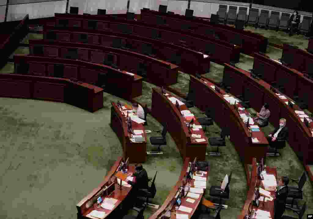 Empty seats of pro-democracy legislators are seen at Legislative Chamber in Hong Kong. Pro-democracy lawmakers announced they would resign en masse after four of them were ousted in a move one legislator said could sound the “death knell” for democracy there. 
