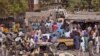 FILE - In this photo taken Jan. 27, 2015, Nigerian soldiers on a truck patrol at a market after recent violence in areas surrounding Maiduguri. In a major offensive against Boko Haram, Nigerian and Chadian jets are bombing the Islamic extremists from nort