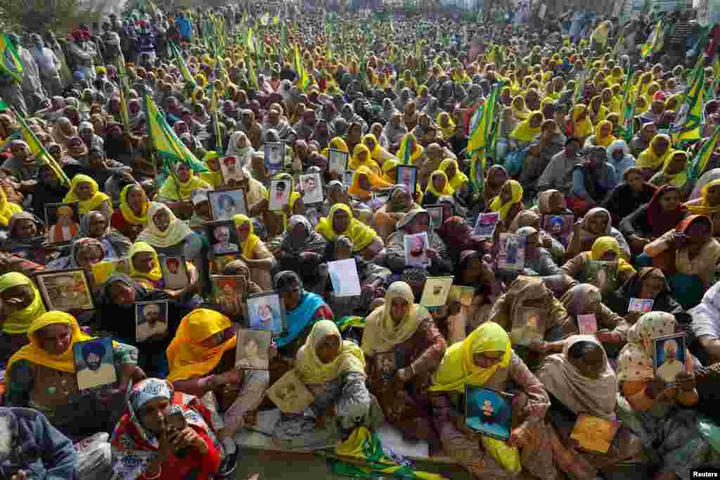 Women, including widows and relatives of farmers who were believed to have killed over debt, attend a protest against farm bills passed by India's parliament, at Tikri border near Delhi.