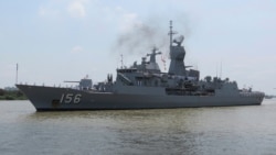 FILE - Royal Australian Navy frigate HMAS Toowoomba prepares to dock at Saigon port in Ho Chi Minh City, Vietnam, April 19, 2018.
