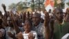 People pray during a rally against French satirical weekly Charlie Hebdo, which featured a cartoon of the Prophet Mohammad as the cover of its first edition since an attack by Islamist gunmen, in Bamako, Mali, Jan. 16, 2015. 