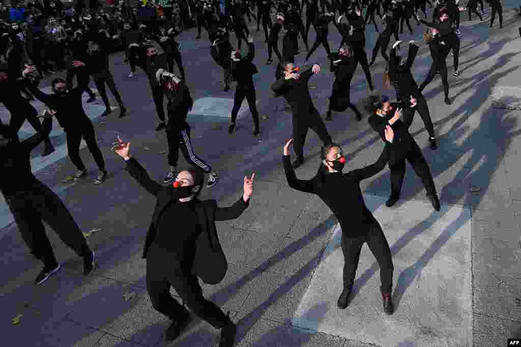 A group of 180 dancers from the group "Les essentiels" dance during a performance in Montpellier, Dec. 12, 2020, to protest against the French government's health policy and the decisions taken with regard to the cultural world.