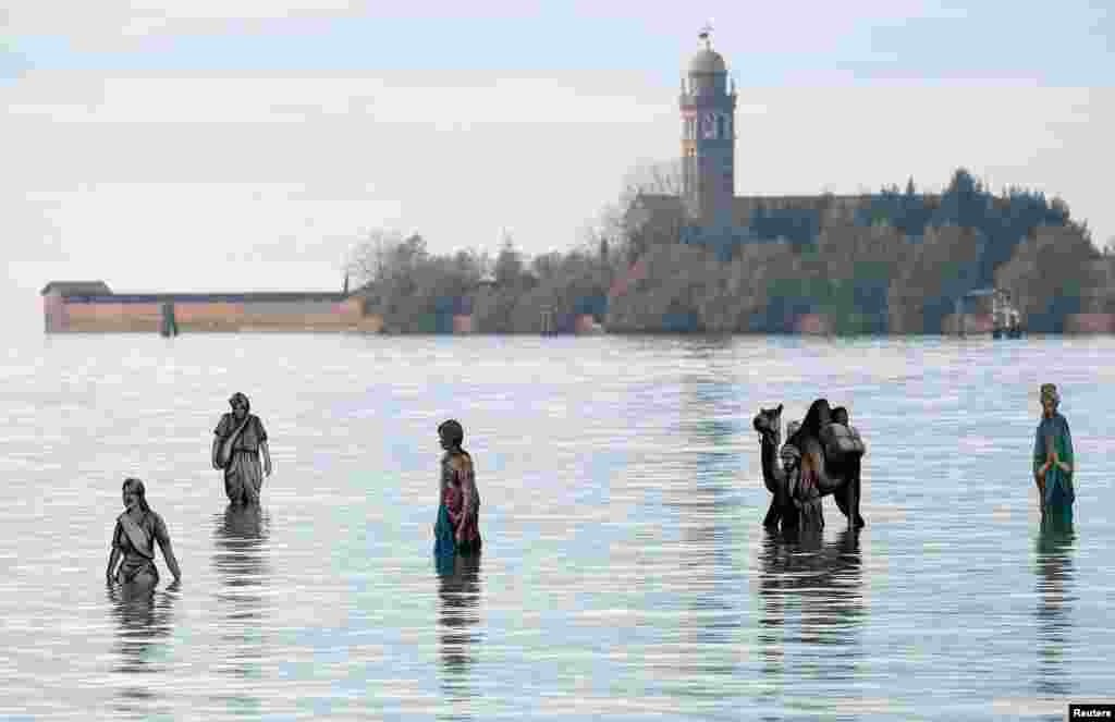 A nativity scene display designed by local greengrocer Francesco Orazio is seen over the water surface of Venice's lagoon by Burano island, ahead of Christmas, in Venice, Italy.