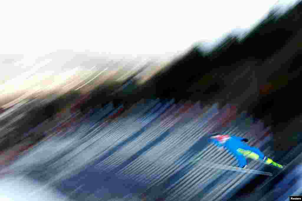 Czech Republic's Ondrej Pazout is seen in action during the men's nordic combined ski jumping competition trial round, in Oberstdorf, Germany.