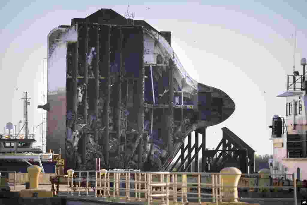 The bow section of the vehicle carrier Golden Ray, with some of the 4,000 cars still onboard, waits to be towed to a scrap yard in Brunswick, Georgia, USA, Dec. 1, 2020. The vessel capsized while sailing outbound from the Port of Brunswick on Sept. 8, 2019.