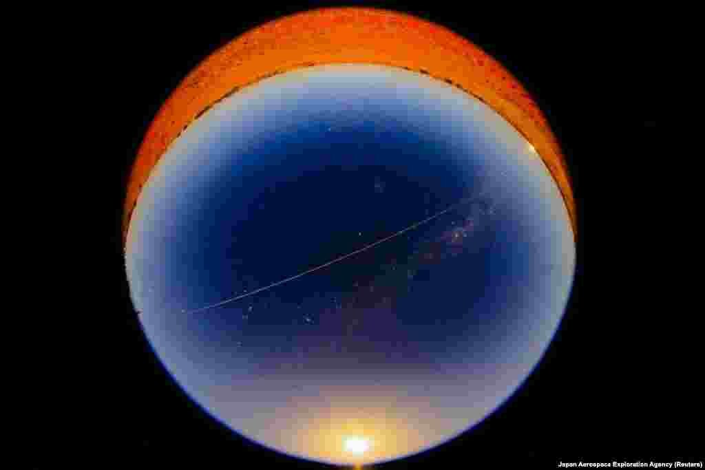 A fireball from Hayabusa2's capsule carrying the first extensive samples of an asteroid is seen as it reentered the Earth's atmosphere while it is observed at Coober Pedy, Australia.