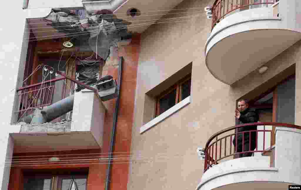 A balcony of a residential building is seen hit by a missile casing in Stepanakert in the region of Nagorno-Karabakh, Nov. 16, 2020.