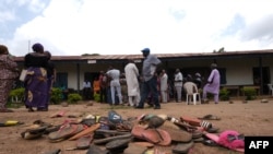 FILE - The belongings of students of Bethel Baptist High School are scattered on school premises as parents of abducted students hope for their return, in the Chikun Local Government Area of Kaduna state, northwest Nigeria, July 14, 2021.