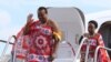 King of Swaziland Mswati III (Front) and one of his 13 wives disembark from a plane after arriving at Katunayake International airport in Colombo, Sri Lanka, August 13, 2012. (Reuters)