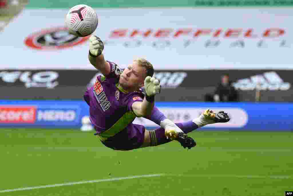 Sheffield United's English goalkeeper Aaron Ramsdale makes a save during the English Premier League football match between Sheffield United and Fulham at Bramall Lane in Sheffield, northern England.
