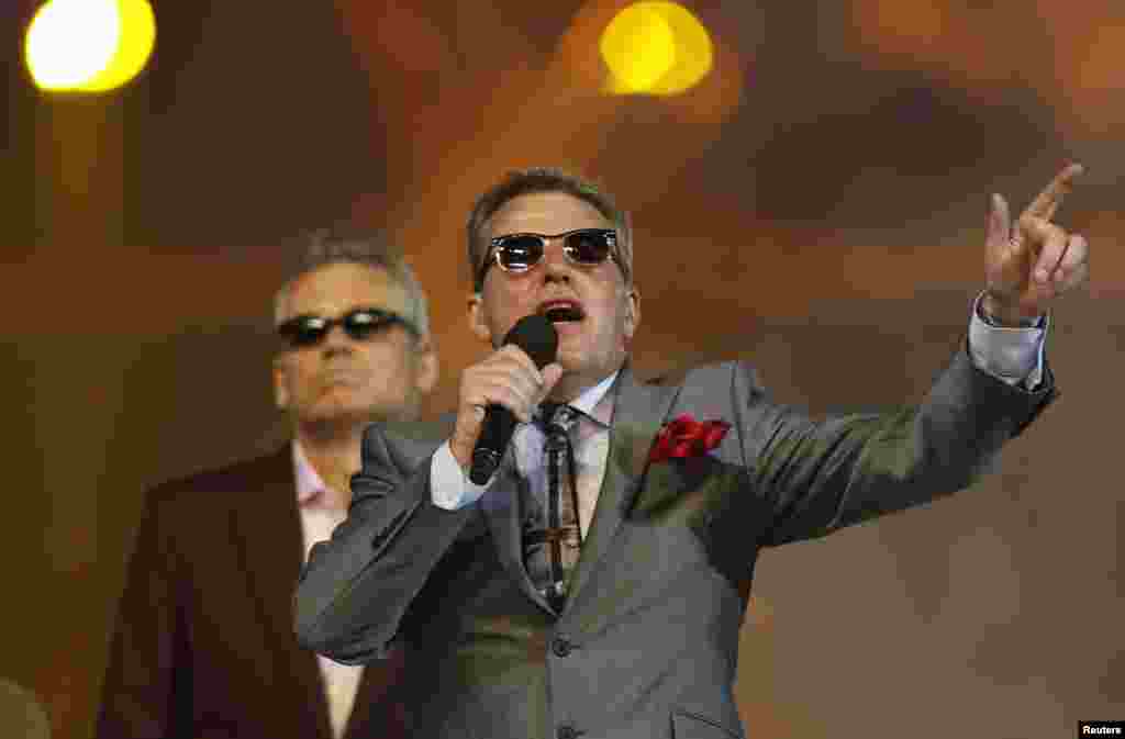 The group 'Madness' performs in the closing ceremony of the London 2012 Olympic Games at the Olympic Stadium August 12, 2012.