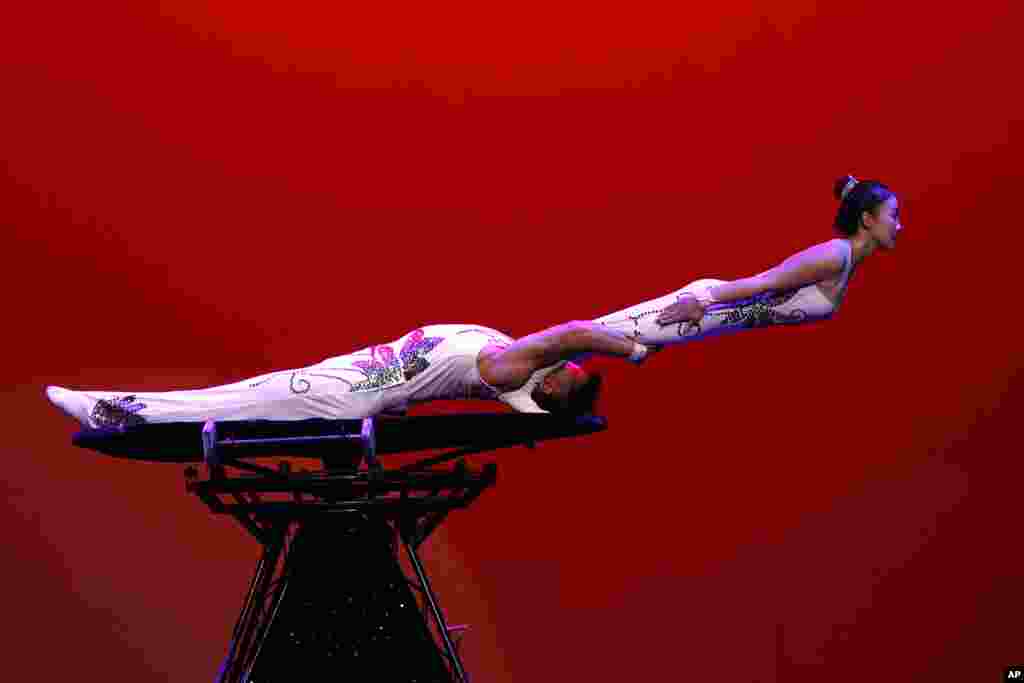 Gymnasts from the Pyongyang Circus Theater perform during Mother's Day in Pyongyang, North Korea.