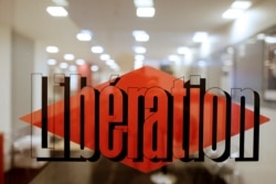 FILE - The entrance to France's newspaper Liberation is seen in Paris, Feb. 20, 2014.