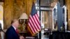 President Donald Trump speaks during a Christmas Eve video teleconference with members of the military at his Mar-a-Lago estate in Palm Beach, Fla., Dec. 24, 2019. 