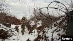 Украинский военнослужащий на позициях. 23 января 2022 г.