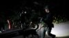 South Korean police officers with dogs leave to search for missing Seoul Mayor Park Won-soon in Seoul, South Korea, July 9, 2020.