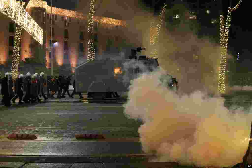 Albanian police and demonstrators clash for the third day, protesting the death of a 25-year-old man shot by a police officer, in Tirana.