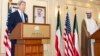 U.S. Secretary of State John Kerry (L) and Kuwait's Deputy Prime Minister and Minister of Foreign Affairs Sheikh Sabah Khalid Hamad al-Sabah speak to the media in Kuwait City, June 26, 2013.